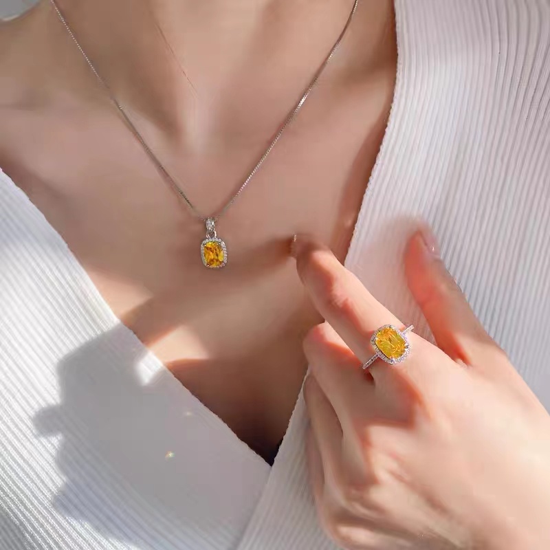 Imitieren Sie gelbes Kristallanhänger-Zirkon-Halsketten- und Ringset STB006